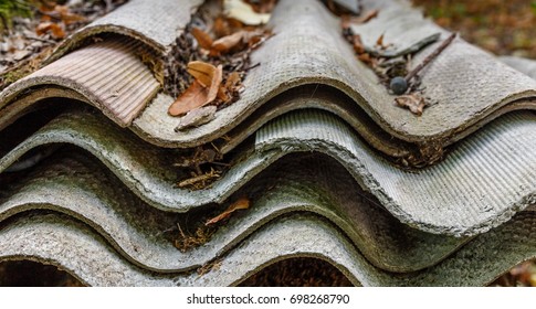 Old and dangerous asbestos roof - Shutterstock ID 698268790