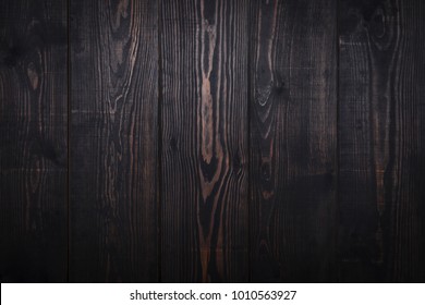 Old dark brown wooden plank background. Vintage and retro style.
