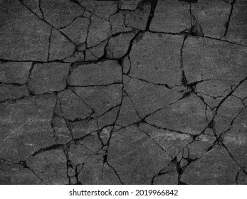 Old dark gray dirty rough uneven grimy paved way. Grunge broken chipped lump boulder city asphalt. Damaged worn lane avenue pitted break. Shabby rustic big granular pieces material of 3d travel design - Shutterstock ID 2019966842