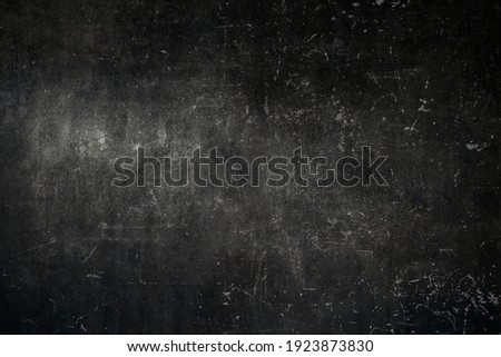 Old dark scratched metal texture grunge background 