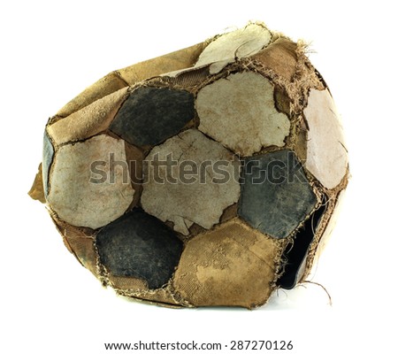 old deflated soccer ball isolated on white