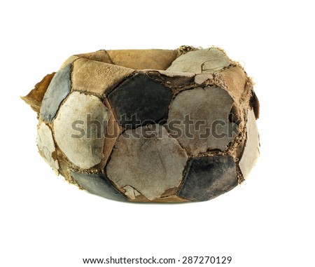 old deflated soccer ball isolated on white