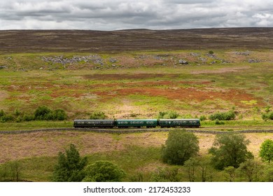 Old Deisel Train Travelling Through North Yorkshire Countryside