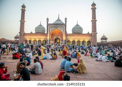 Old Delhi, India-April 3 2022: People at the Jama Masjid during time for iftar, or the breaking of the fast, on the first day of Ramzan