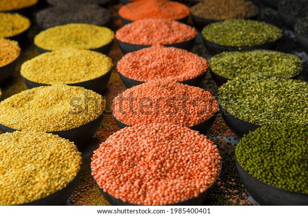 Old Delhi,\
India-Jan 13 2011: A variety of lentils or pulses on display at a\
wholesale grocery store in Rui Mandi, Sadar Bazaar, old Delhi,\
India. Prices of lentils have risen\
sharply.
