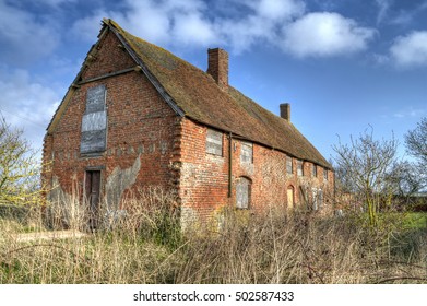 an old derelict farm building in the english countryside