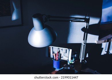 An Old Desk Lamp Is Hit By Evening Light.