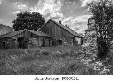 Old destroyed wooden house. Black and white photo