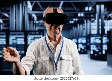 Old developer immersed in virtual reality at data center, doing hardware maintenance. Professional using VR headset to optimize server rows system performance, harnessing cutting edge technology