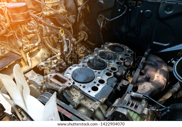 Old diesel engines are\
being repaired.