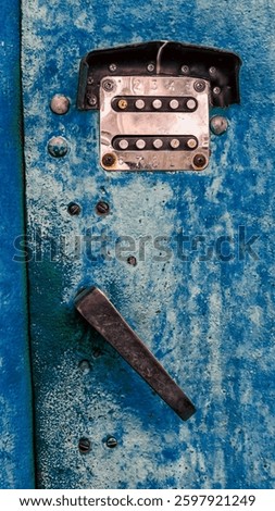 old digital combination lock on an iron door close up