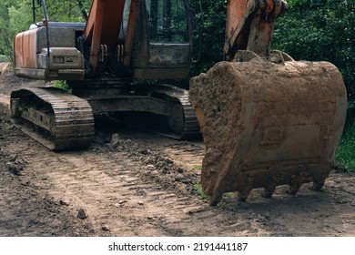 Old Dirty Bucket Of Crawler Excavator, Close Up.