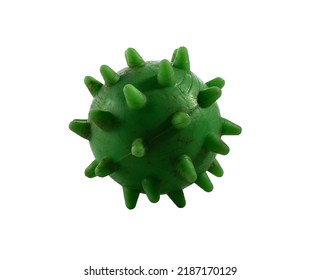 Old And Dirty Green Dog Toy With Lots Of Scratches. The Toy Looks Like A Coronavirus. The Photo Has A Perfectly Pure White Background With A Clipping Path