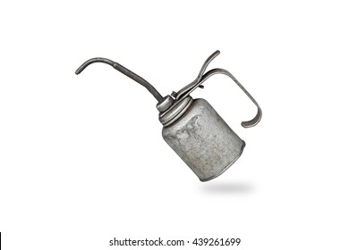 Old and dirty metal oil can, isolated on white background                               