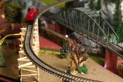 An Old And Dirty Model Railway Track On Scratch Built Model Bridge In The Scene Appear The Model Train As A Background Represent The Model Train For Hobby Concept Related 
