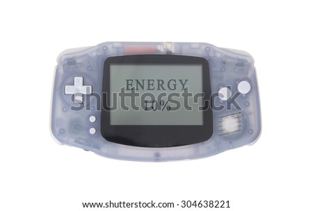 Old dirty portable game console with a small screen - energy at 10 percent
