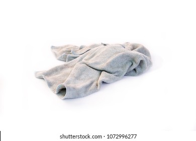 Old dirty rag isolated on white background. Cleaning rag