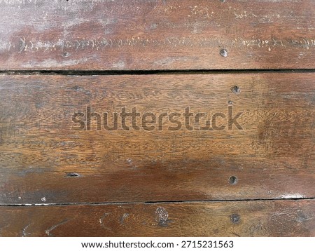Old dirty strong hard solid wooden table with scratch damage, brown color, vintage furniture