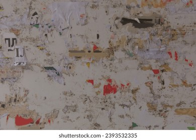 Old dirty tattered paper bulletin board texture background.