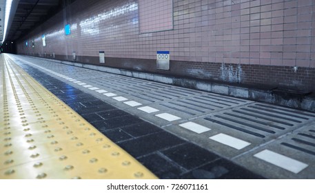 Old and dirty train platform or underground subway station in Osaka city Japan.