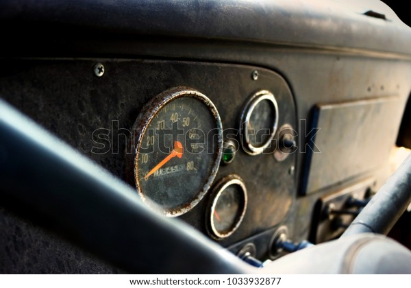 Old, dirty truck\
dashboard - speedometer