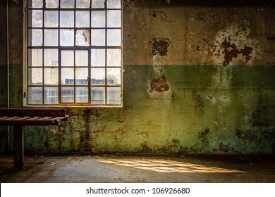 Old And Dirty Wall Of The Interior Of An Out Of Order Factory