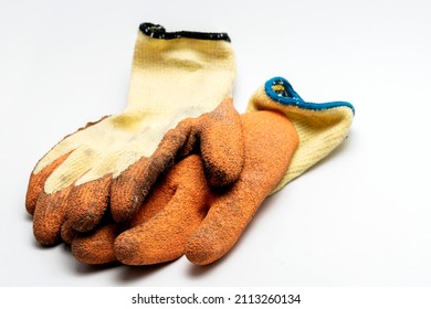 Old Dirty Work Gloves Isolated On White