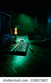 An Old Disassembled Computer Is On The Table. Lava Lamp, Smoke In The Evening Setting