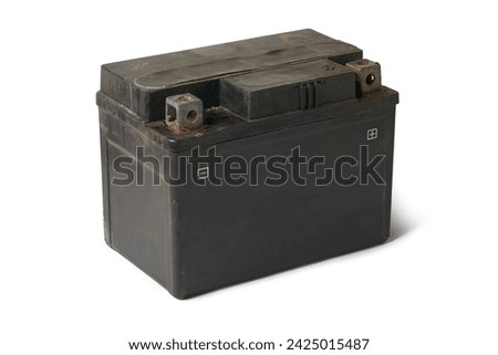 old discarded motorcycle battery, used lead acid battery isolated on white background, contain lead, sulfuric acid and other toxic chemicals which pose environmental hazards