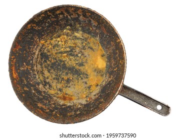 Old Disgusting Stained Rusty Cast Iron Pan With Burnt Fat And Food Leftovers Isolated In Directly Above Perspective