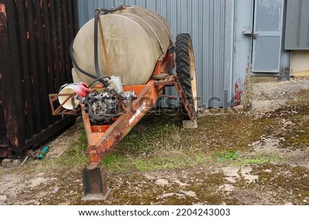 An old disused water bowser on a farm near Aldbury, in Hertfordshire, England.