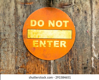 Old Do Not Enter Sign On A Wooden  Door