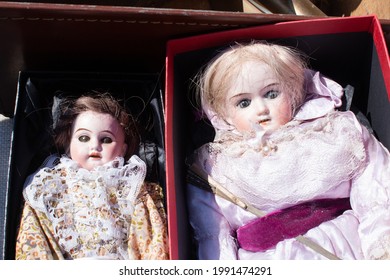 Old Dolls At A Second-hand Car Boot Fair In York, UK.