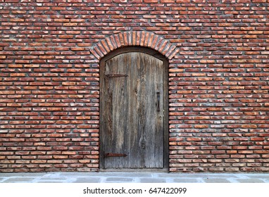 Old door in a brick wall