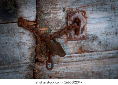 Old Door Chain And Rusty Lock