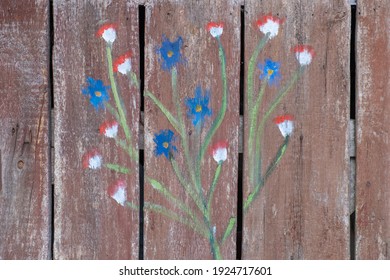 An old door with a cute floral ornament. Light burgundy aged, faded wood with stains. Textured background. - Shutterstock ID 1924717601