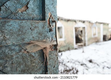 Old Door Handle With Cobweb In Old Abandoned Yard