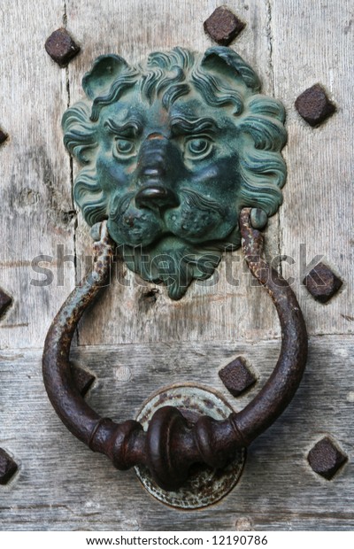 Old Door Knocker On Wooden Castle Stock Photo Edit Now 12190786