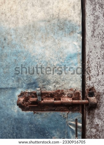 Old door latch. Is an additional lock that can be added besides the default lock from the door handle. This latch can be made of various materials.