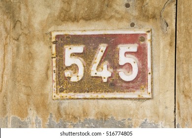 Old Door Number Sign