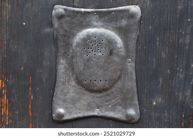        old door speaker on a door                         - Powered by Shutterstock