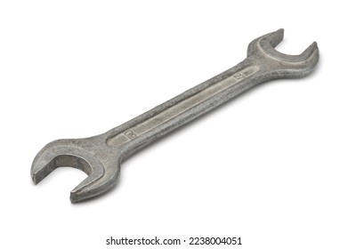 Old double open end wrench isolated on white