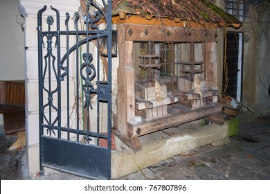 Old Double Screw Press With Christmas Decoration Near Hammered Hatch. Wurzburg, Germany.
