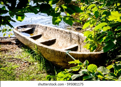 Old Dugout Canoe At A Lake