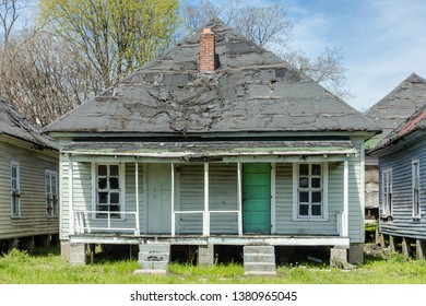 Old Duplex House Located Near Railroad Tracks Left Abandoned In The Deep South Of Birmingham Alabama On Clear Day