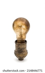 Old Dusty Ceiling Light Bulb In Rural Socket