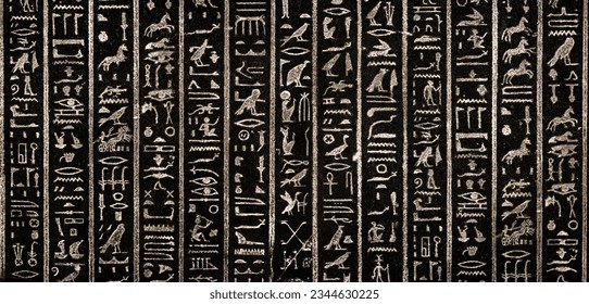 Old Egyptian hieroglyphs on an ancient background. Wide historical and culture background. Ancient Egyptian hieroglyphs as a symbol of the history of the Earth. 
