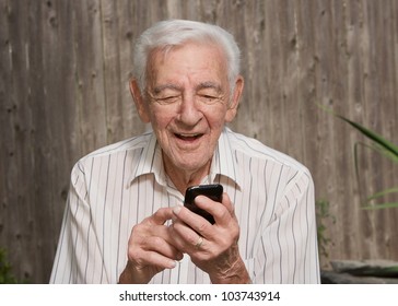 Old Elder Senior Man On Mobile Smart Phone