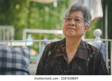 Old Elderly Elder Woman Resting Relaxing In Garden