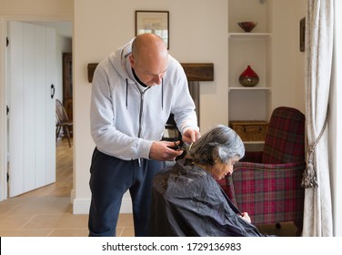 Old Elderly Woman Having A Haircut At Home During Coronavirus, UK